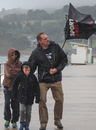 A family on a rainy day out in Teignmouth