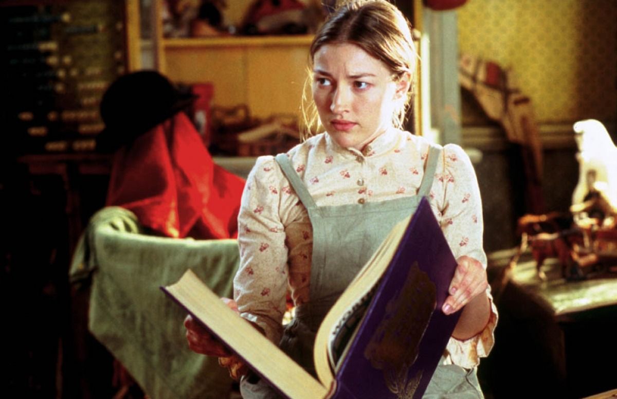Nanny McPhee - Evangeline looking up from a book concerned
