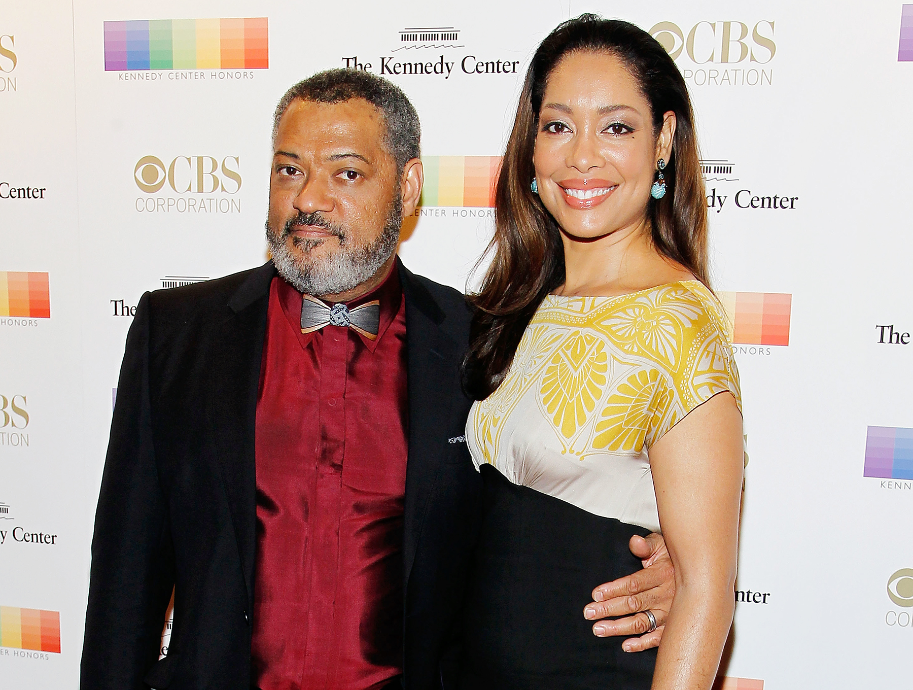 Gina Torres and Laurence Fishburne