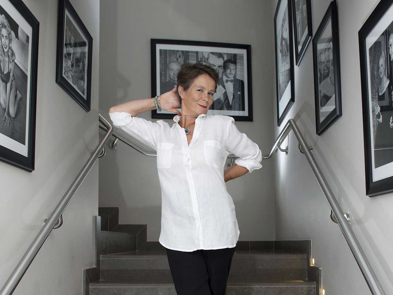 Celia Imrie posing on her stairs