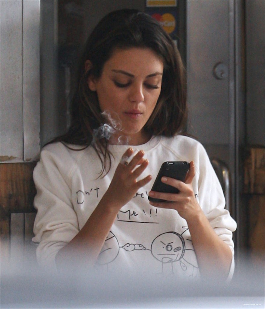 celebs caught smoking cigarettes mila kunis