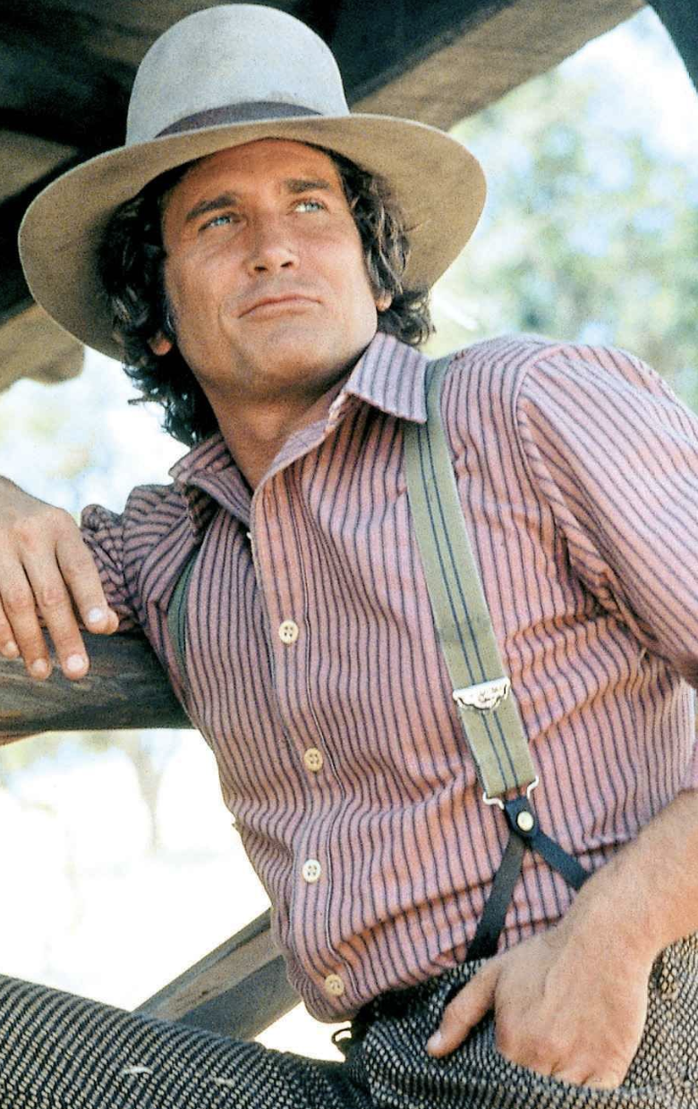 little house on the prairie cast charles posing in a barn