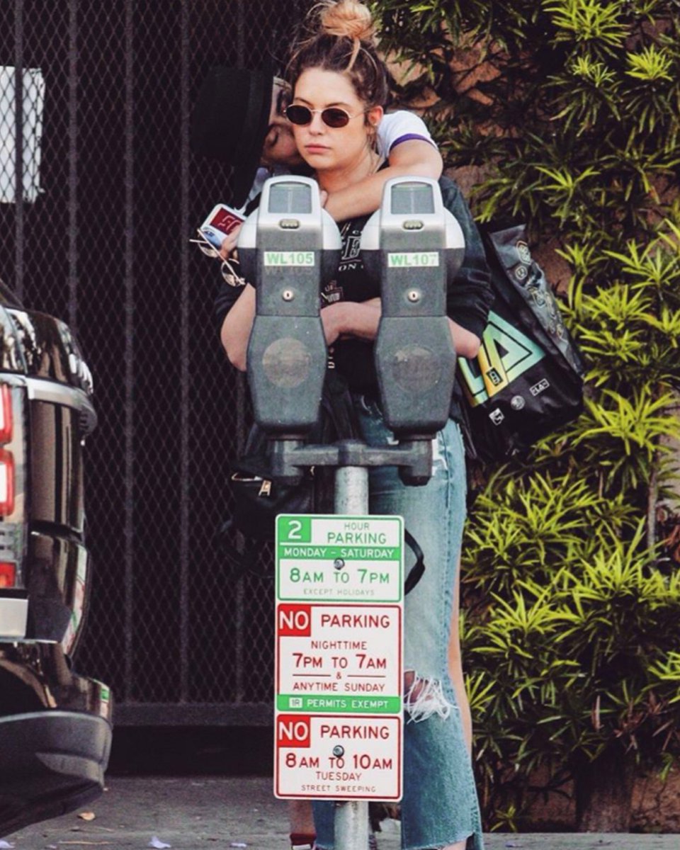 Cara and Ashley hugging in a Parking Lot