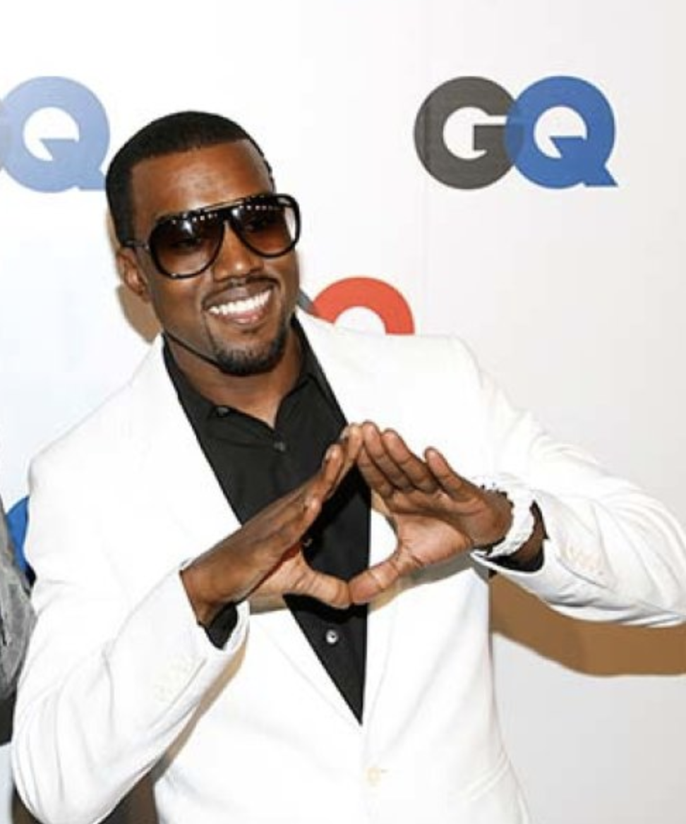 kayne west doing the illuminati sign