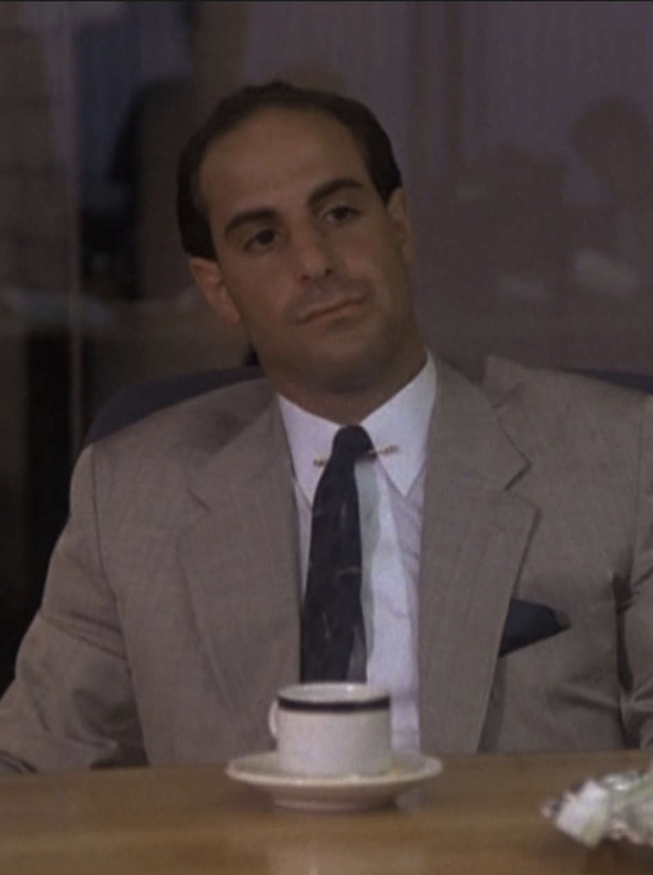 Miami Vice's Frank Mosca sitting with a coffee