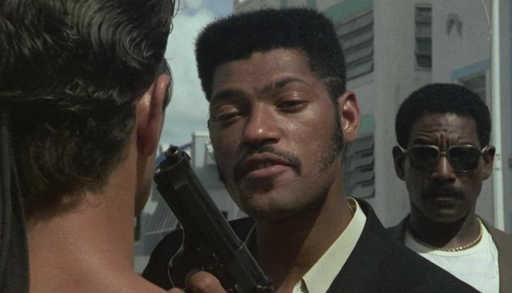 Miami Vice's Keller holding a gun