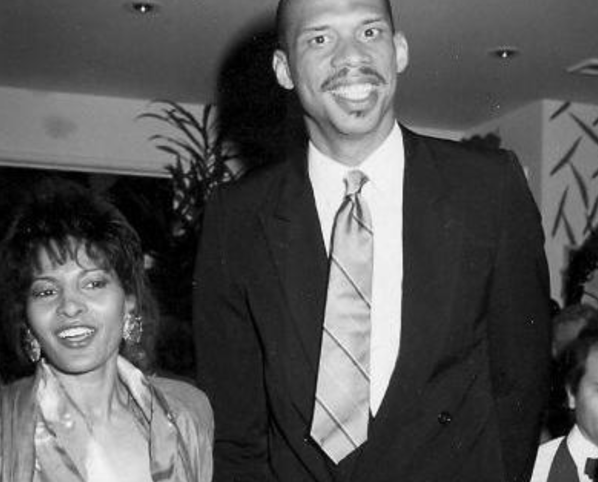 A black and white image of Miami Vice's Pam Griers (Valerie) and Kareem