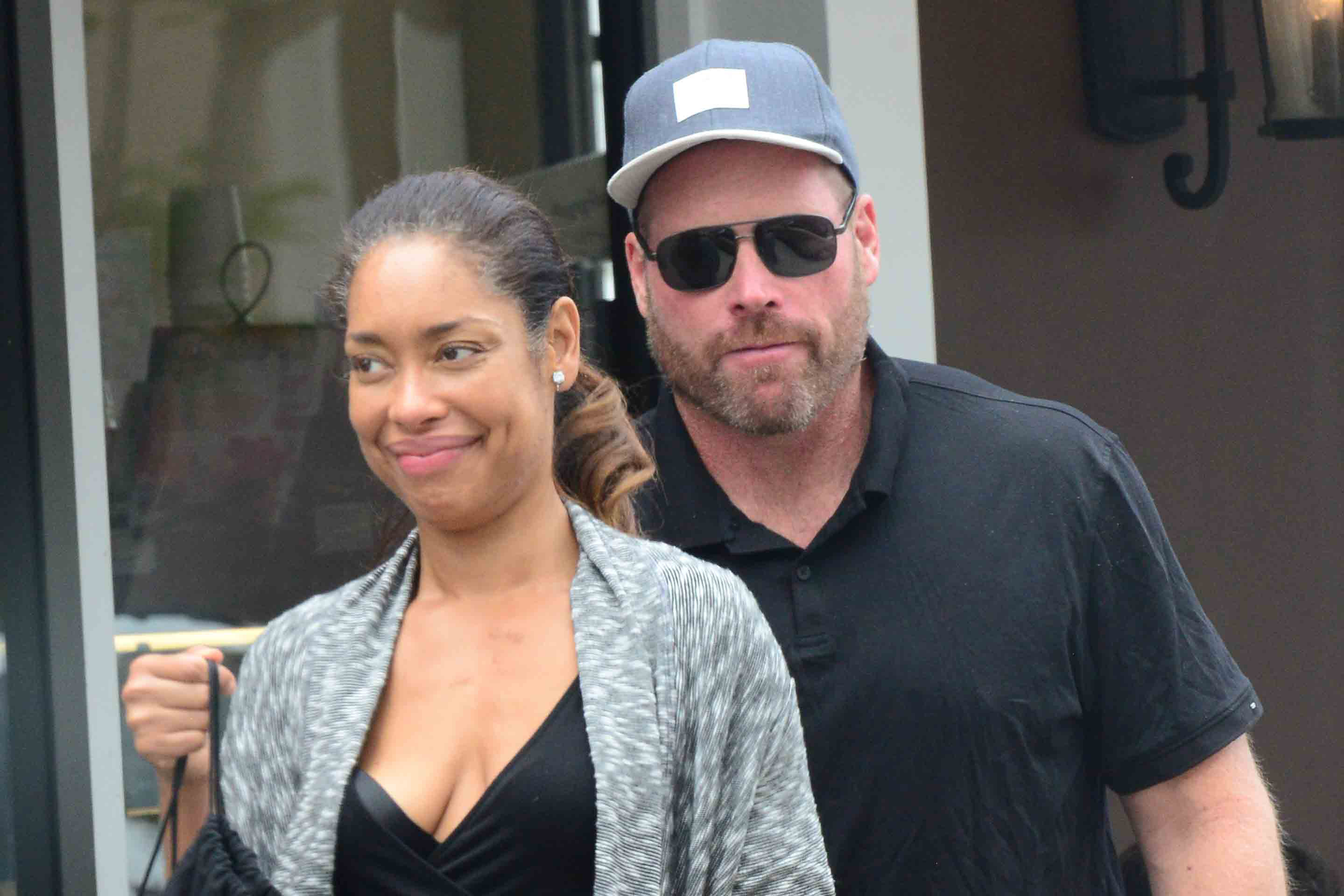 Gina Torres and a mystery man
