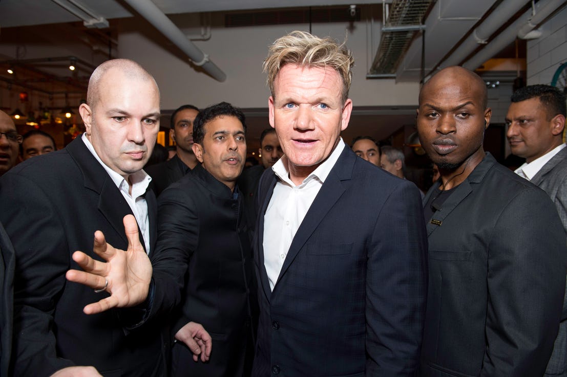 Gordon Ramsay with his bodyguards