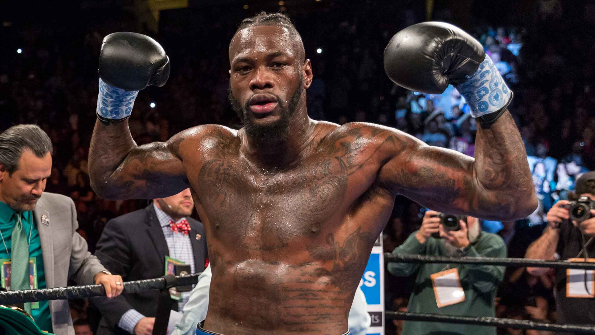 Deontay Wilder net worth - Deontay posing after a match