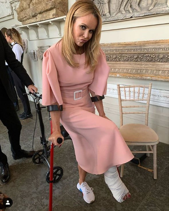 Amanda Holden on crutches