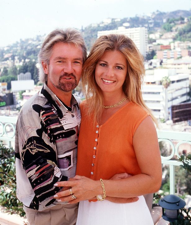 helen soby noel edmonds pose on balcony