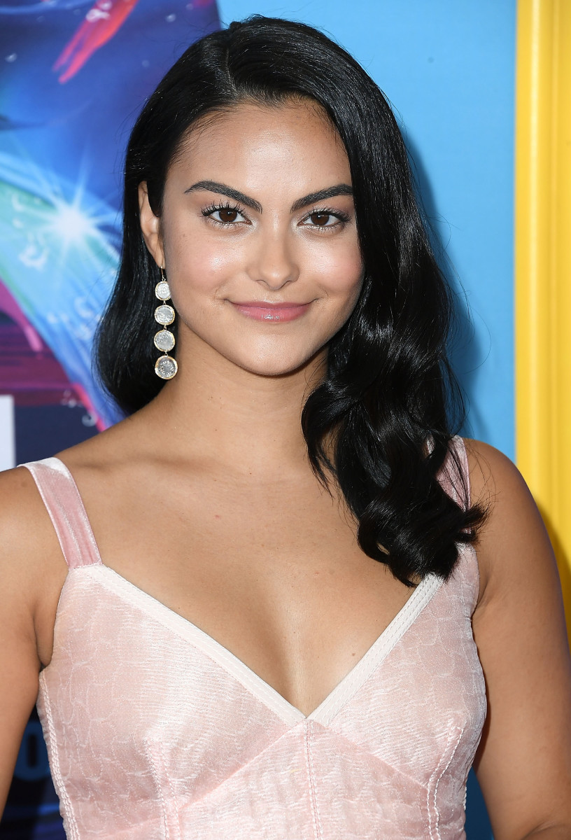 Camila Mendes age - posing for a photo