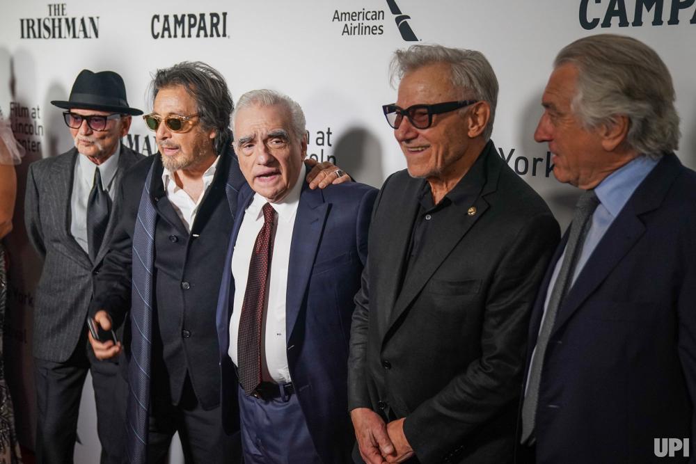 Many The Irishman cast members worked previously with director Martin Scorsese (center)