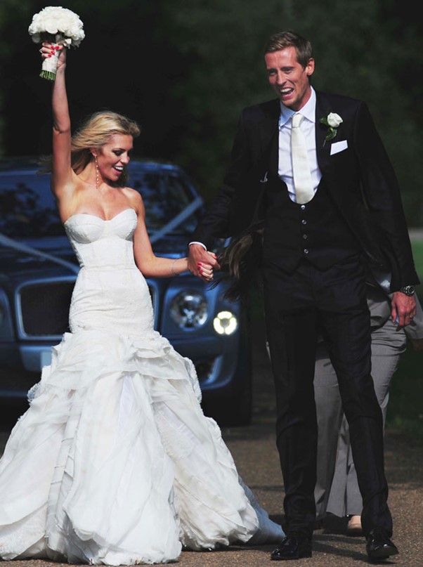 Model Abbey Clancy and footballer Peter Crouch on their wedding day.