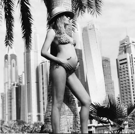 Abbey Clancy looking beautiful as she shows off her baby bump in Dubai.