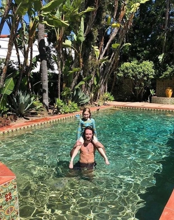  Piers Morgan’s children enjoying the swimming pool at their luxury Hollywood home.