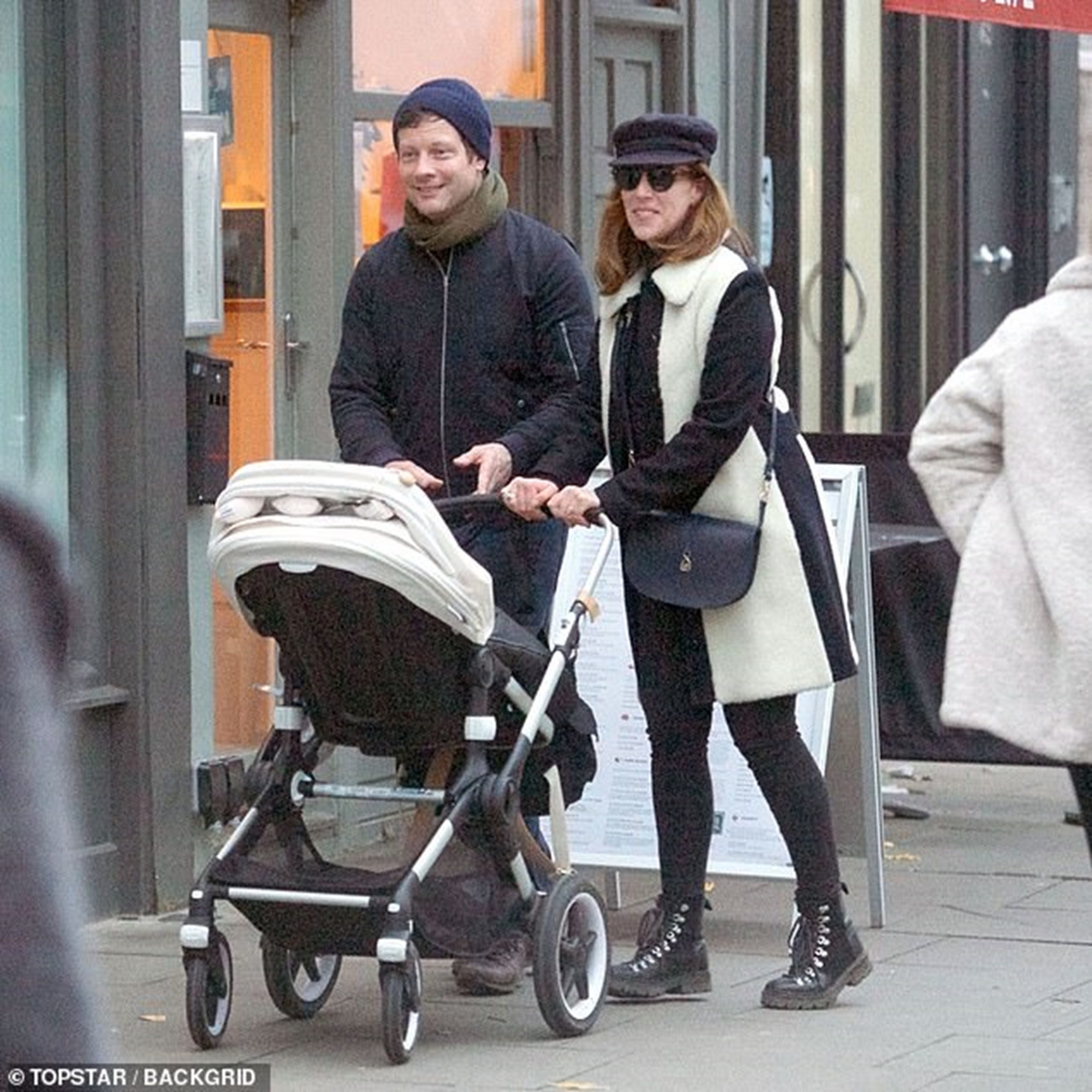 Dermot and Dee enjoying a stroll with baby Kasper.