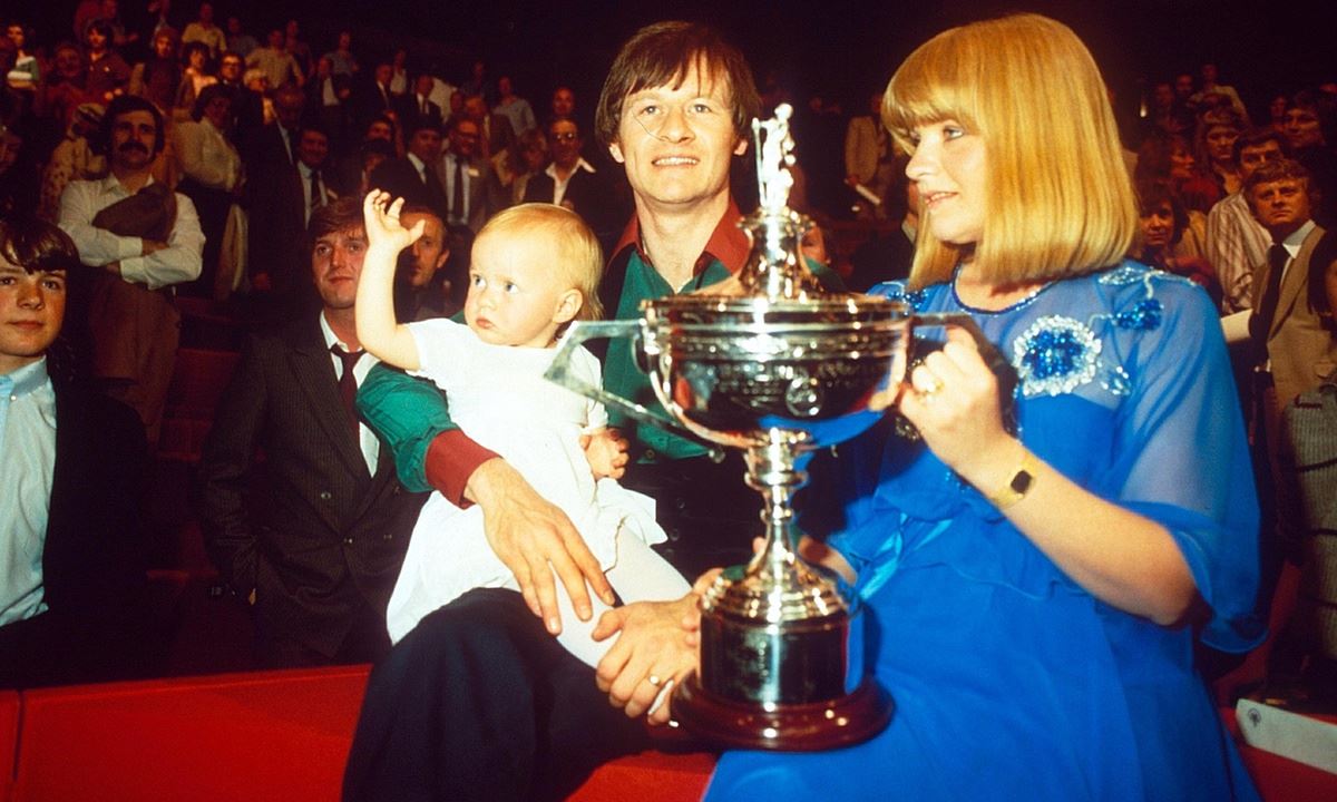 Higgins celebrating his snooker world title victory in 1982 with wife Lynn and baby daughter Lauren.