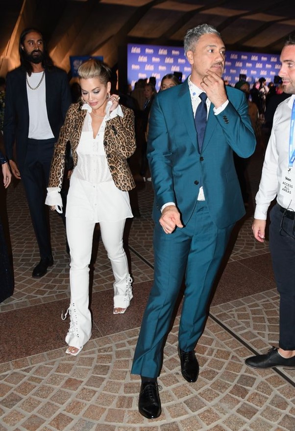 Rita Ora heads out with boyfriend Taika Waititi.