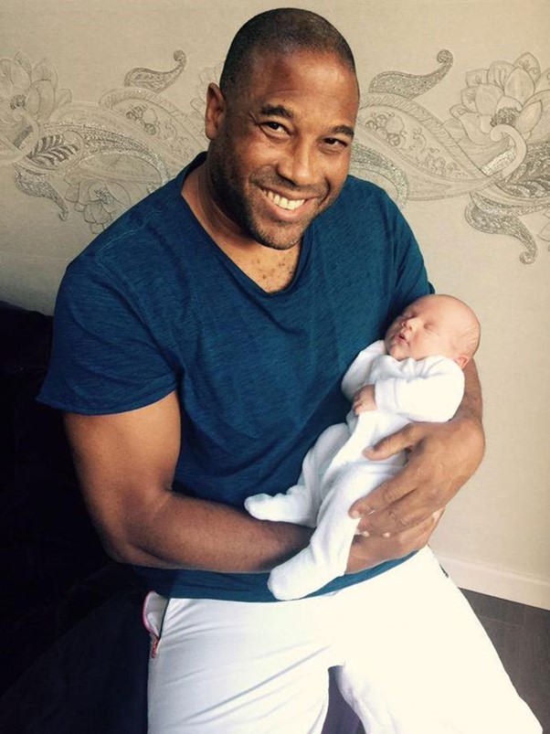 John Barnes Children: with his first grandchild.