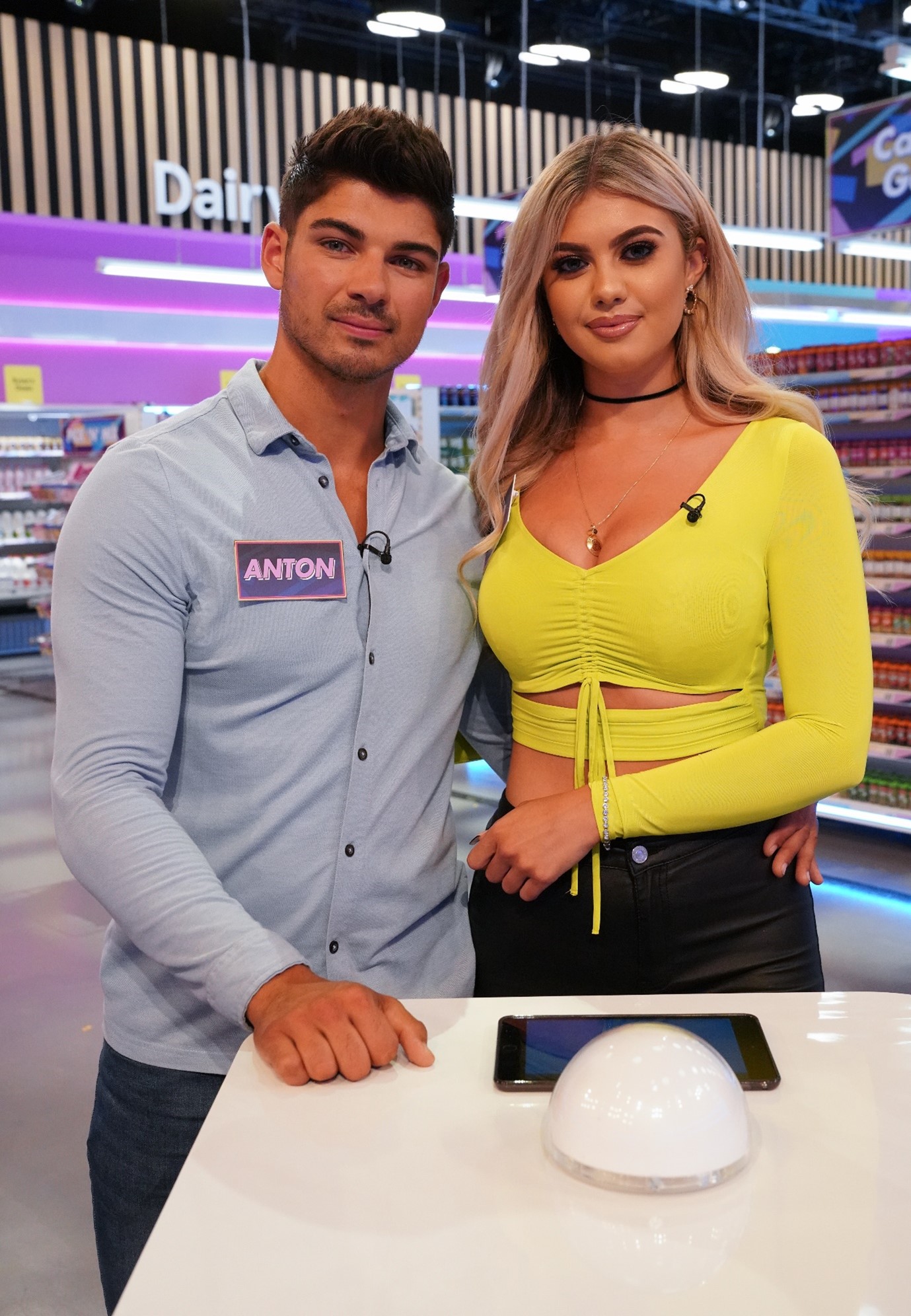Belle Hassan and Anton Danyluk star in a Love Island edition of Supermarket Sweep.