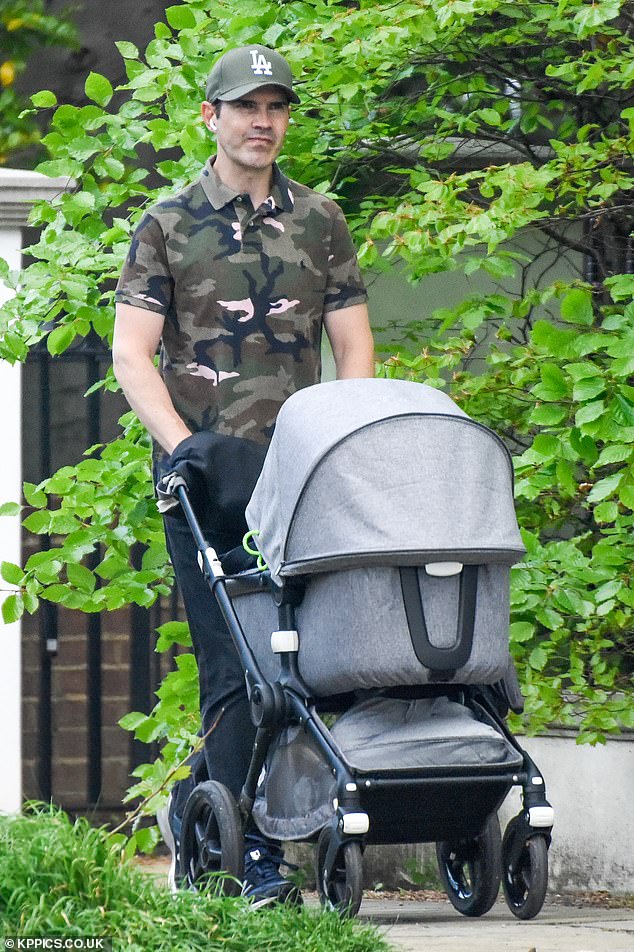 Jimmy Carr Girlfriend: The comedian and Karoline with baby Rockefeller. 