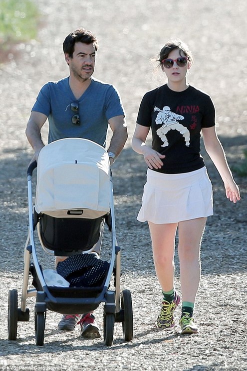 Elsie Otter Pechenik: Zooey and Jacob take their new daughter for a stroll.
