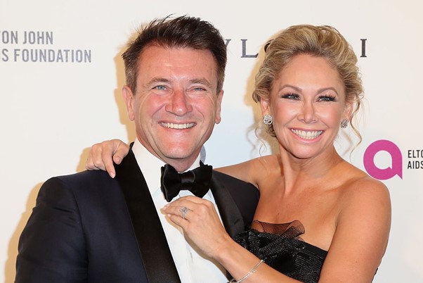 The TV host with his new wife and former dance partner Kym Johnson.