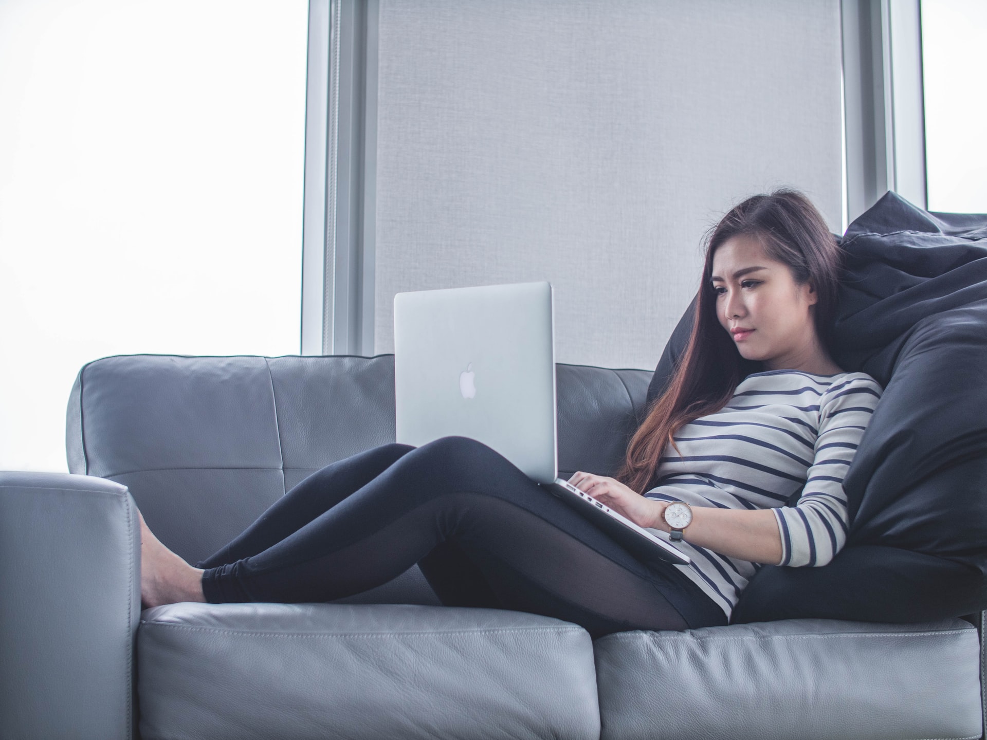 Woman Lying on Sofa