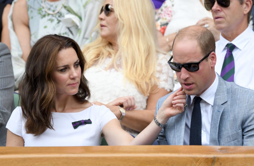 Kate cleaning her husband's face.